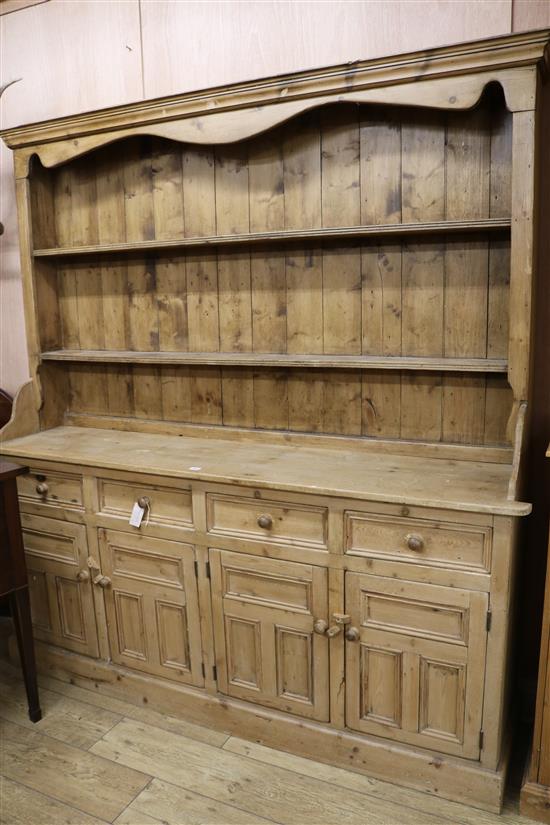 A pine kitchen dresser, W.183cm